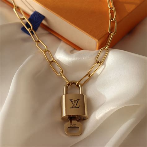 louis vuitton lock pendant necklace.